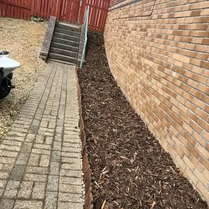 Neat garden borders with fresh mulch